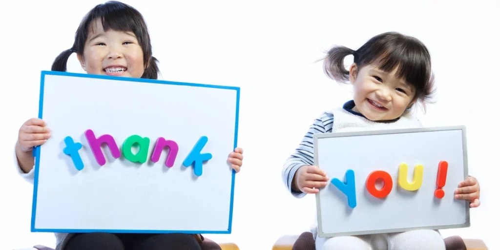Happy children learning kindness, respect, and gratitude through engaging activities.